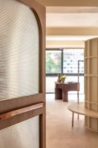 A modern office space featuring wooden furnishings.