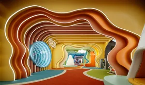 A brightly colored, modern playground with curved walls and a colorful indoor slide.