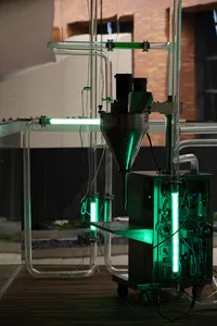 Industrial machinery with green tubing and metal components