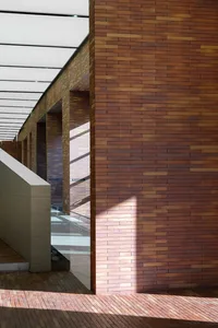 Modern indoor space with brick wall feature