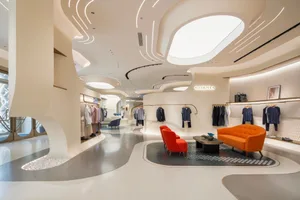 Modern retail space with concrete, glass, and metal finishes