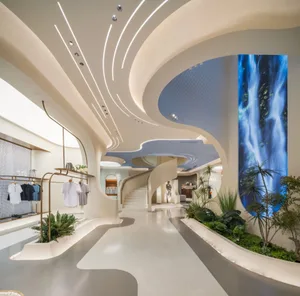Modern retail space featuring concrete floors, glass walls, and metal accents