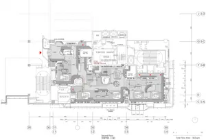 A 2D rendered architectural plan of the second floor of a building, showing various rooms and spaces.