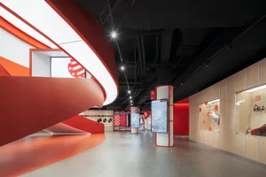 Modern retail space featuring red and white color scheme and concrete and glass materials