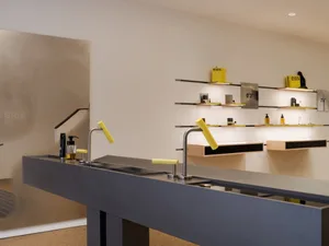 Modern retail space featuring concrete countertops and minimalist design