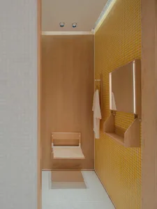Minimalist bathroom featuring wood and ceramic tiles