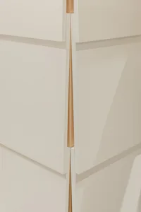 Close-up of minimalist interior design featuring wood elements