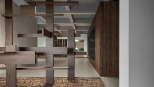 Modern lobby with wooden features and minimalist design.