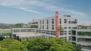 A modern office building with concrete exterior.