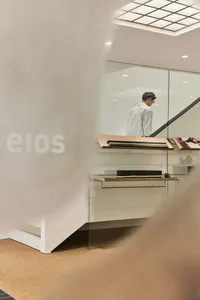 A modern office space featuring a glass counter.
