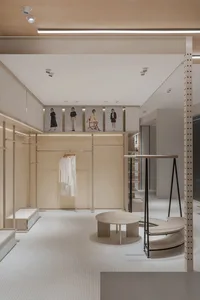 Modern retail store interior designed with wooden elements and minimalist aesthetic.