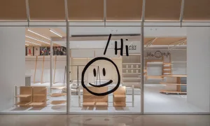Modern retail storefront with glass walls and minimalist design