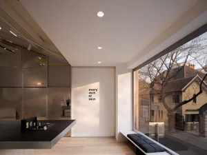 Modern spa interior designed in minimalist style with clean lines and a serene atmosphere.