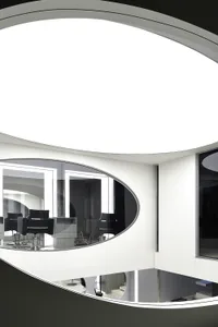 A modern interior space featuring glass elements.