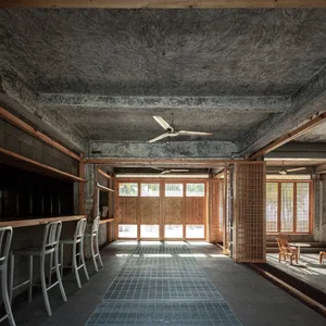 Concrete lobby featuring industrial design elements.