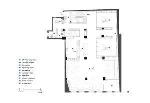 Floor plan of a modern commercial interior with various functional spaces labeled and detailed.