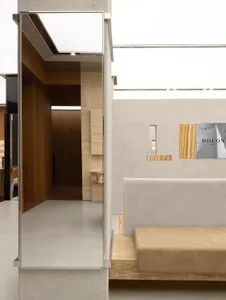 Modern retail storefront featuring concrete and marble materials