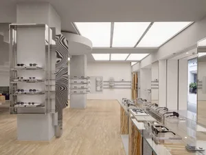 一間以大理石與混凝土飾面打造的現代太陽眼鏡店。