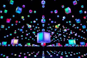 Colorful LED light installation featuring suspended cubes in a contemporary space.