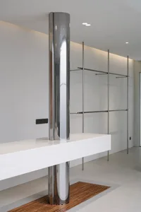 Modern minimalist interior design with white marble and stainless steel