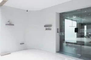 Modern retail storefront with glass and concrete materials