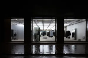 Modern retail space featuring metal, glass, and concrete materials