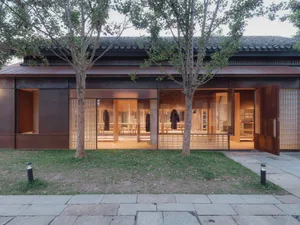 A modern storefront with glass walls and interior