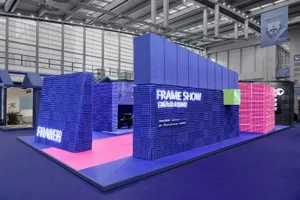 An exhibition space designed with foam tiles and blue and pink color schemes