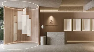 A minimalist office interior with wood accents and a modern design.