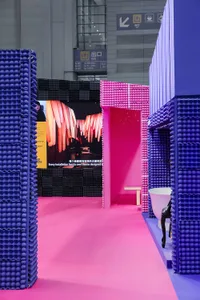A modern installation featuring colorful plastic modules in various shapes and sizes.