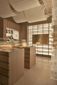 Modern retail store with glass showcases for display.