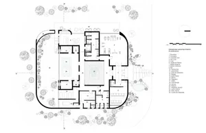 Floor plan of a modern commercial space with concrete, glass, and steel materials
