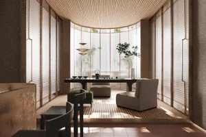 A modern minimalist living room with wooden floors and furniture.