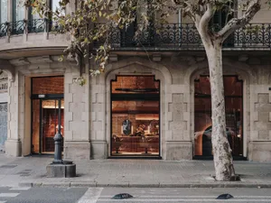 Modern retail storefront with glass and stone exterior