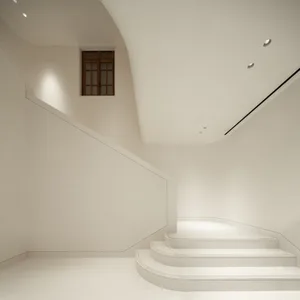 Minimalist interior design featuring concrete stairs