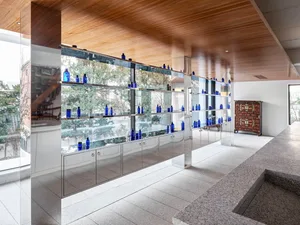 A modern storefront with large glass panels.