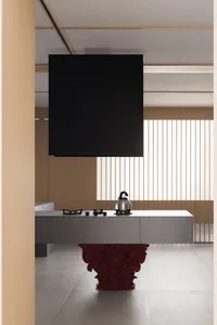 A modern minimalist kitchen featuring sleek, contemporary design elements and a minimalist color palette with some natural li
