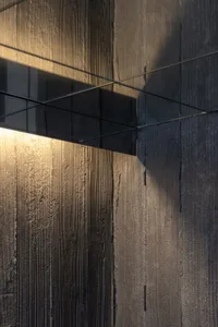Concrete and glass architectural elements in an interior design setting