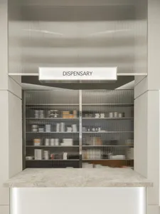 Modern dispensary with metal, glass, and concrete shelving.