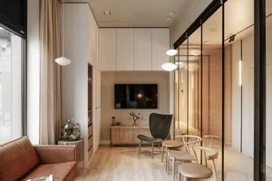 A modern living room with minimalist design, featuring wood flooring and furniture.