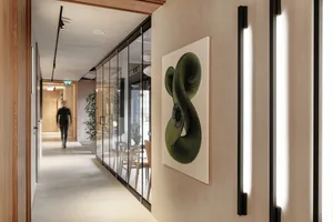 Modern office environment featuring wooden accents and contemporary design elements.