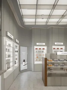 A modern retail space featuring well-lit shelves with various products.