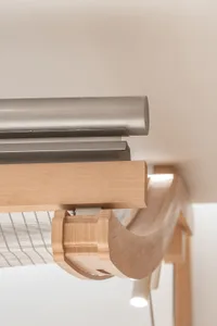 Modern furniture featuring wood and metal materials.