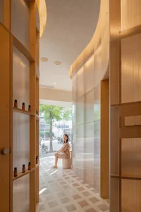 A serene spa interior designed with wooden and acrylic materials.