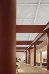 Modern office space featuring industrial-style metal columns.