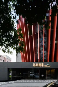 Modern hotel entrance with glass architectural elements