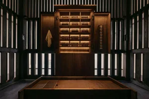 Modern spa interior with wooden shelves and lighting