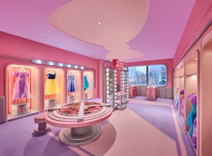 An image of a retail playroom with vibrant pink materials.