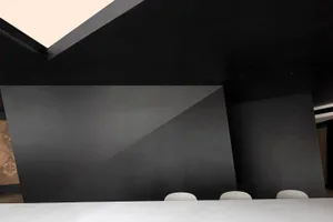 A minimalist concrete interior design featuring geometric shapes and clean lines.