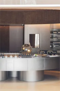 Modern retail storefront featuring a metallic counter.